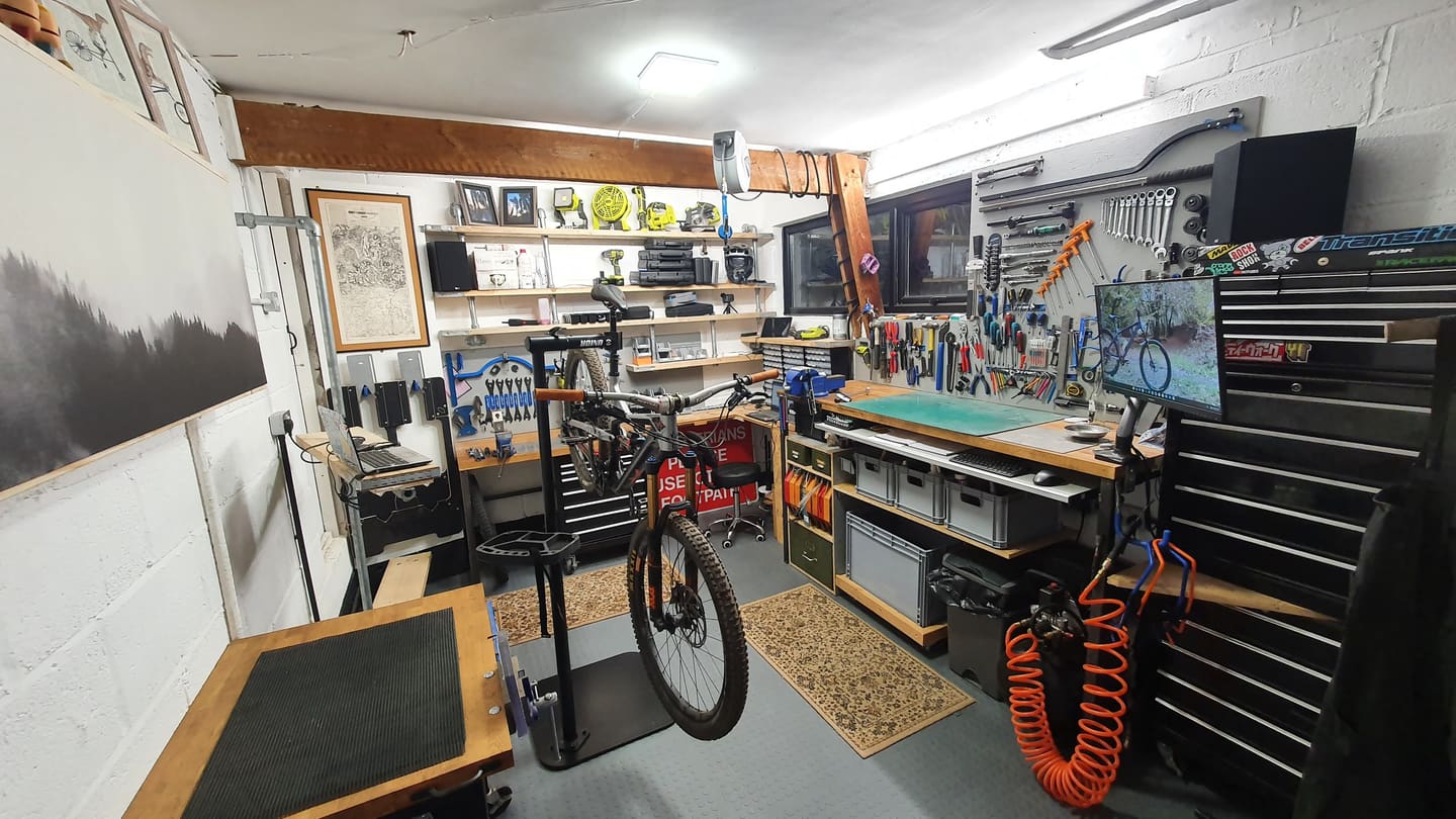 The fully equipped CrankShop workshop, with a bike on the workstand
